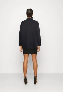 Monki Damen Bluse - Black Dark -Monki Verkäufe 2022 40902b383b8948e092ebe5e743b23938